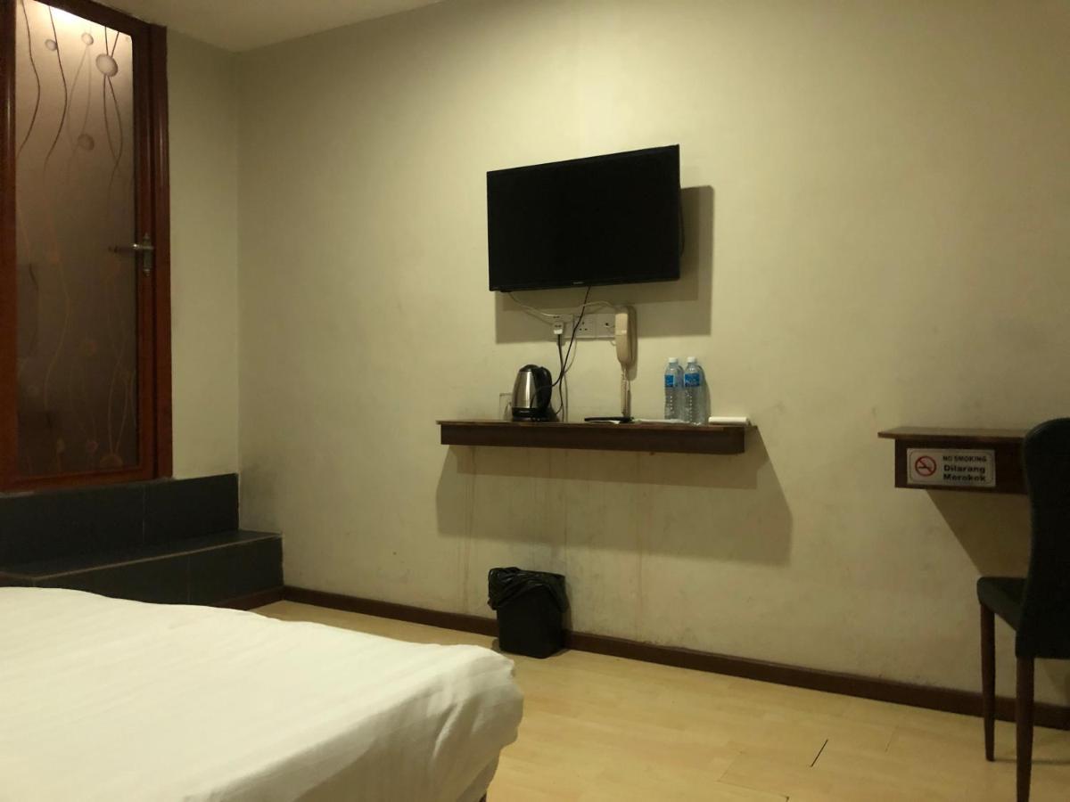 Super Oyo 90668 Joy Inn Мири Экстерьер фото